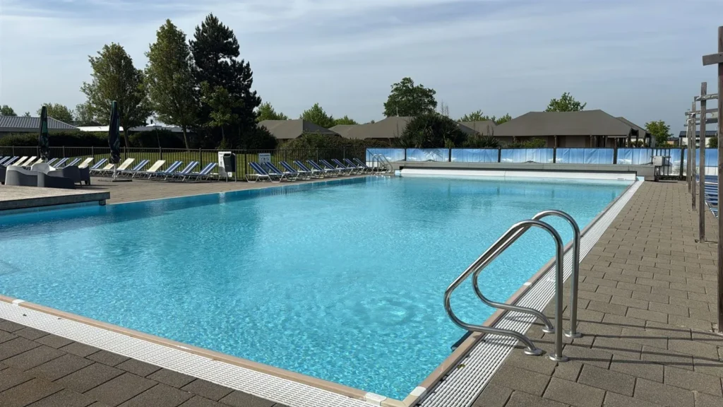 Outdoor stainless steel pool at a holiday park in Zeeland