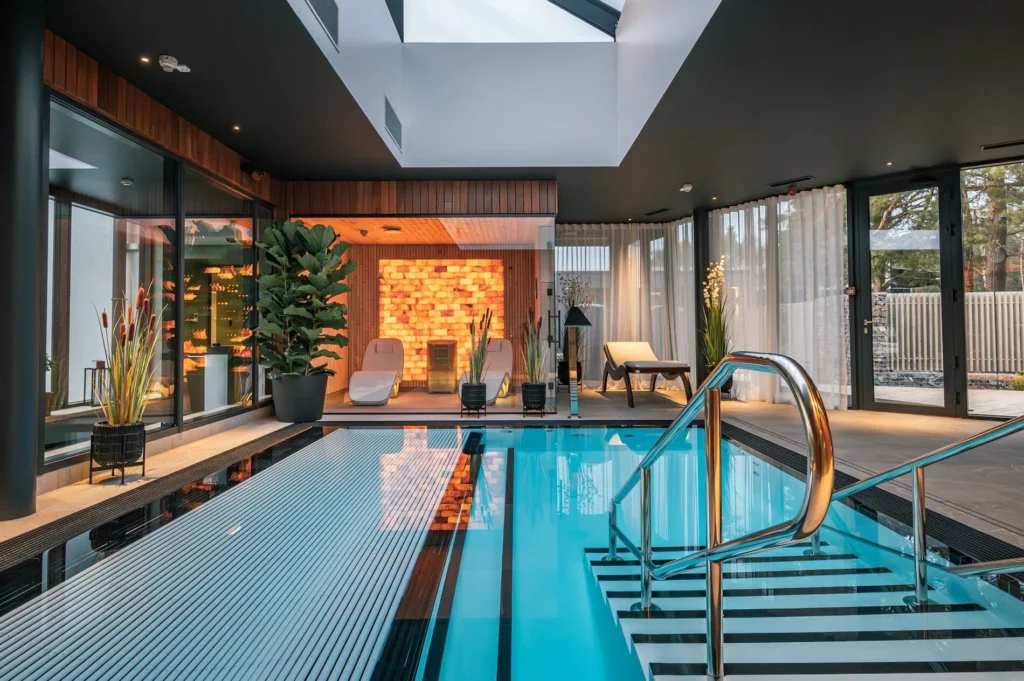 Built-in stairs with handrail in an indoor pool